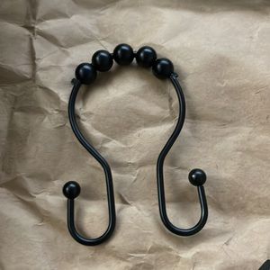 Shower curtain hooks